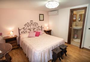 Postel nebo postele na pokoji v ubytování B&B Il Chiostro Assisi