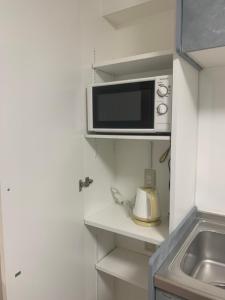 Cucina o angolo cottura di COPO YONEGAHAMA l 米が浜通
