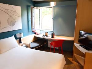 Postel nebo postele na pokoji v ubytování Hotel ibis Narbonne