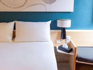 Postel nebo postele na pokoji v ubytování Hotel ibis Narbonne