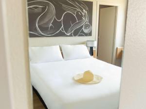 Postel nebo postele na pokoji v ubytování Hotel ibis Narbonne