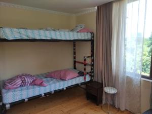 Ένα ή περισσότερα κρεβάτια σε δωμάτιο στο Valdi Guest Shekvetili