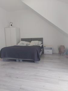 Pokoje i apartamenty MatDar客房内的一张或多张床位