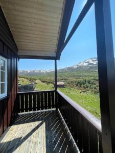 a view from the balcony of a house at Bjørgo Gard - Stegastein in Aurland
