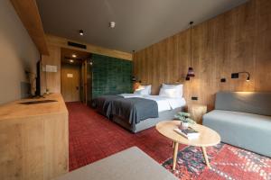 Postel nebo postele na pokoji v ubytování Hotel Nomad