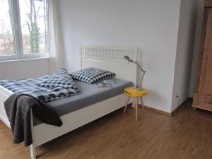 Tempat tidur dalam kamar di K9 Wohnungen