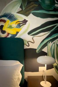 Cama ou camas em um quarto em Mysa Properties - Verdi Suites
