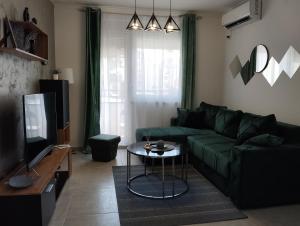 Predel za sedenje v nastanitvi Apartman Green!!