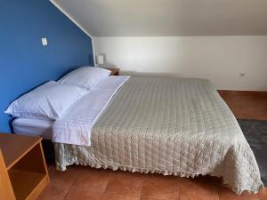 Postel nebo postele na pokoji v ubytování Someplace Apartments
