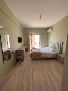 Postel nebo postele na pokoji v ubytování VILA -Te Golja