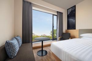 Postel nebo postele na pokoji v ubytování Fairfield by Marriott Jaipur