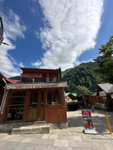 a building with a sign in front of it at Abduloğlu Butik Otel in Ayder Yaylasi +17 photos