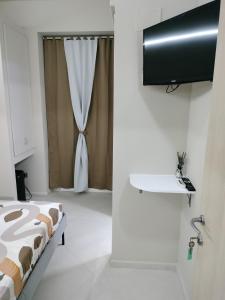 Postel nebo postele na pokoji v ubytování Residence PEGA B&B
