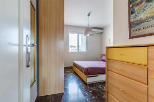Posteľ alebo postele v izbe v ubytovaní A&N Xauen Torre del Mar