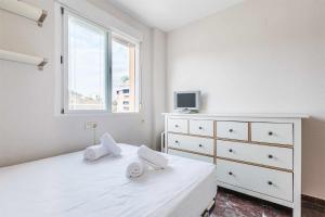 Posteľ alebo postele v izbe v ubytovaní A&N Xauen Torre del Mar