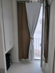 Postel nebo postele na pokoji v ubytování Residence PEGA B&B