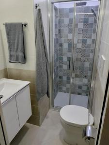 Koupelna v ubytování Residence PEGA B&B