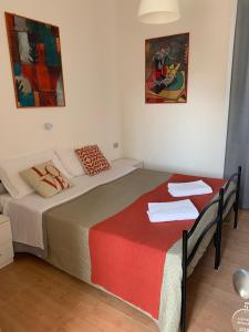Postel nebo postele na pokoji v ubytování Hotel Migani