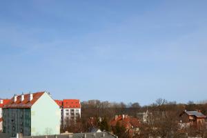 a view of a city with houses and buildings at Elite Apartments Sandy in Gdańsk
