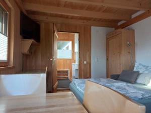Postelja oz. postelje v sobi nastanitve Ferienwohnung in Schwarzach Vorarlberg
