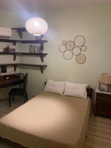 מיטה או מיטות בחדר ב-Liberty porosview apartement