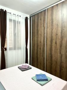 Ένα ή περισσότερα κρεβάτια σε δωμάτιο στο Apartman Marko