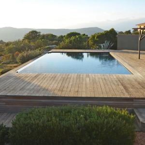 a swimming pool on top of a house at Résidence Bianca Casa in Porto-Vecchio