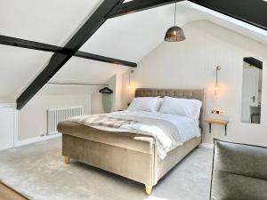 Postel nebo postele na pokoji v ubytování Minster Heights