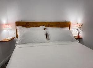 Postel nebo postele na pokoji v ubytování Taffetà b&b