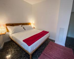 Postel nebo postele na pokoji v ubytování Taffetà b&b