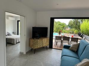 TV a/nebo společenská místnost v ubytování Residence Mare e Monte