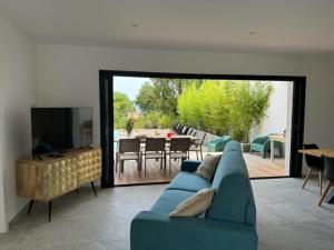 TV a/nebo společenská místnost v ubytování Residence Mare e Monte