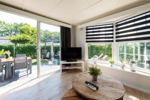 Κήπος έξω από το 68, Stijlvol & Rustig Tuinverblijf met Lounge & Airco! Nabij Efteling