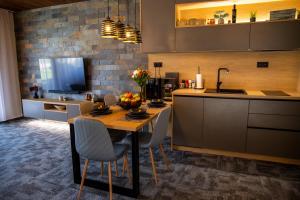 Kuchyň nebo kuchyňský kout v ubytování Apartmán Hrabušice