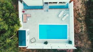 an overhead view of a swimming pool in a backyard at Villa Draga in Mostar