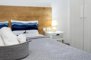 Postel nebo postele na pokoji v ubytování Marti Garden Suites