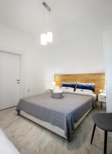 Postel nebo postele na pokoji v ubytování Marti Garden Suites