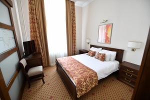 Postel nebo postele na pokoji v ubytování Hotel Beograd