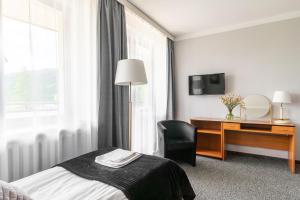 TV a/nebo společenská místnost v ubytování Hotel Helios 300m od Krupówek nowy BASEN od 12 lipca