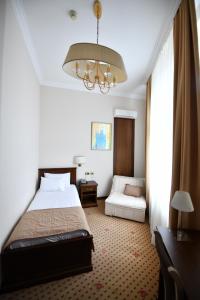 Postel nebo postele na pokoji v ubytování Hotel Beograd