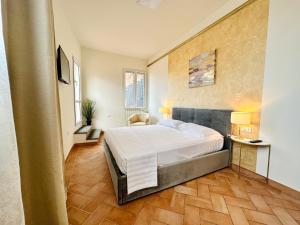 A bed or beds in a room at San Marco View