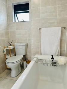 Kylpyhuone majoituspaikassa Air Lux - What a Modern Oasis