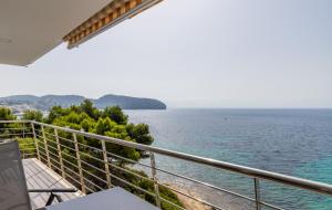 a view of the ocean from the balcony of a house at Mar de Moravit by Nora Nice in Moraira