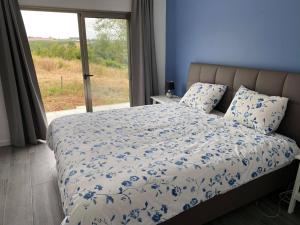 מיטה או מיטות בחדר ב-Quinta Estrela d'Alva