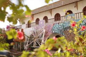 a building with a mural on the side of it at Nook seaview in Dahab