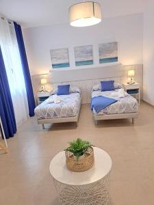 Posteľ alebo postele v izbe v ubytovaní Villa Las Tres J + 37 fotografií