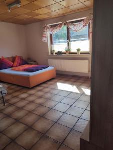 Katil atau katil-katil dalam bilik di Appartement am Waldesrand