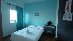 Letto o letti in una camera di DONG’HOME东东小院