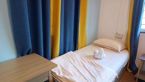 Letto o letti in una camera di DONG’HOME东东小院