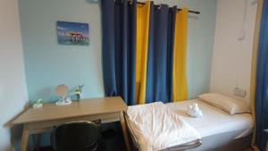 Letto o letti in una camera di DONG’HOME东东小院